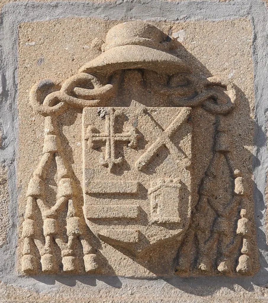 Heraldic stonework on the façade of Casa Grande in Braga.