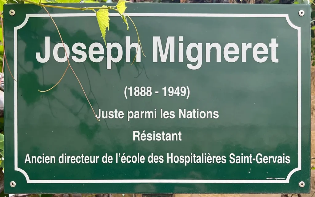 Joseph Migneret memorial sign in the garden.